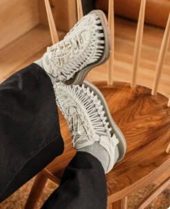 Keen Women's UNEEK Sneaker | Sea Moss/Tangerine -Footique Shop WUNEEKOGLifestylePDPLeft 1